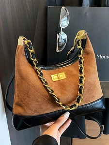 Borsa sottobraccio retrò trapuntata in camoscio marrone e finiture in pelle nera