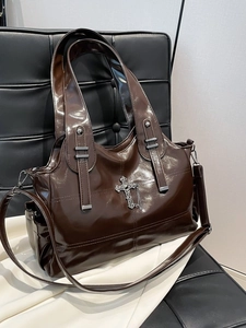 Vintage glossy dark coffee tote bag with silver cross decor and adjustable strap