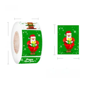 Detail of Christmas roll stickers with Santa graphics, 3x4cm size, 500 labels per roll