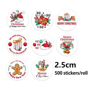 Roll of 500 Christmas stickers featuring 8 holiday designs like gift boxes and bells