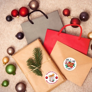 Christmas Kraft paper stickers with Merry Christmas and Ho Ho Ho patterns on gift boxes