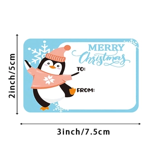 Christmas penguin gift label sticker roll measuring 2x3 inches with blue border design