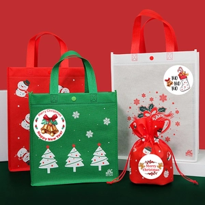 Christmas non-woven gift bags set with festive snowman and tree prints in red and green