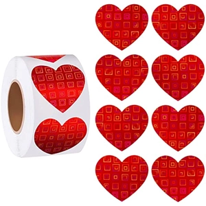 Red heart roll stickers with geometric patterns for gift wrapping and holiday decoration