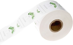 Detail view of round homemade labels with green leaf design and date recording lines