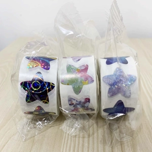 Three rolls of holographic star stickers with cosmos patterns in clear plastic bags
