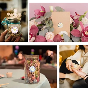 Detailed application of floral Thank You stickers on gift boxes and greeting cards
