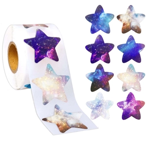 Detailed view of colorful star space stickers with nebula patterns in rolls for decoration