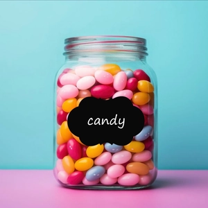 Detail of waterproof blackboard label with candy text on a clear glass candy jar