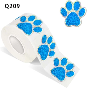 Détail des autocollants pattes de chien pailletés holographiques bleus en rouleau