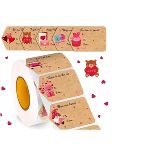 Roll of 500 Valentine heart gift stickers with bear and cupcake designs on kraft paper