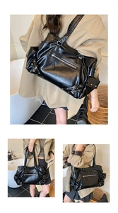 Detailed views of a black large-capacity tote bag with punk metal zippers and buckles