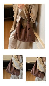 Détail du sac bandoulière en cuir mat marron avec motifs de fleurs ajourées élégants