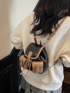 Retro contrast color mini backpack in black and brown PU leather with metal buckles
