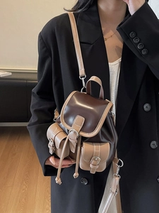 Retro contrast color mini backpack in dark brown leather with drawstring closure