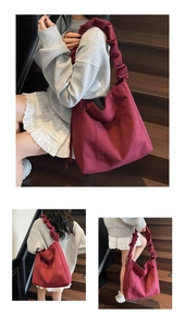 Detail of burgundy corduroy tote bag with ruffled straps and large front pocket