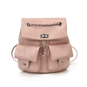 Pink faux leather backpack with silver chain details and flap pockets on white background
