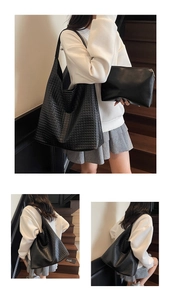Three-way view of a large black woven tote bag with inner pouch on a female model