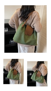 Detail of contrast-colored canvas and leather tote bag with stylish button closure