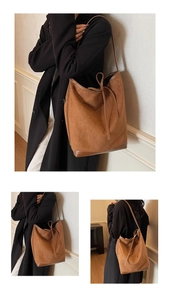 Detailed close-up of brown faux suede bucket bag with stitched bottom and drawstring closure