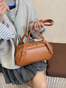 Sac à bandoulière cylindrique marron en cuir PU lisse avec boucles dorées élégantes