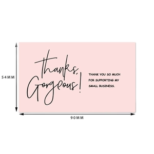 Macro view of a 90mm x 54mm pink business thank you card with gorgeous script lettering
