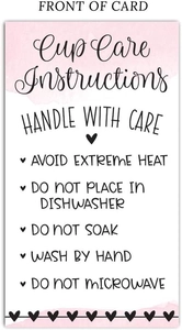Macro shot of glass care instructions cards with pink watercolor accents and cleaning tips