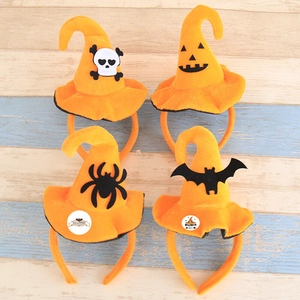 Set of four Halloween headbands featuring pumpkin, spider, skull and bat designs