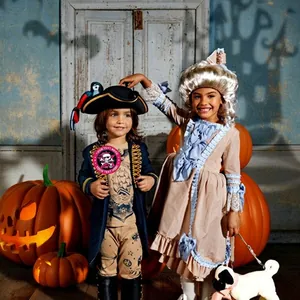 Kids Halloween pirate costume and 18th century court dress with decorative pumpkins