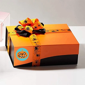 Halloween gift box featuring orange lid, black base, spider web ribbon and pumpkin sticker