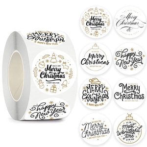 Stickers de Noël en rouleau avec motifs noir et or comme des sapins et des rennes