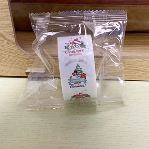Detailed view of Christmas roll stickers in protective packaging with festive patterns