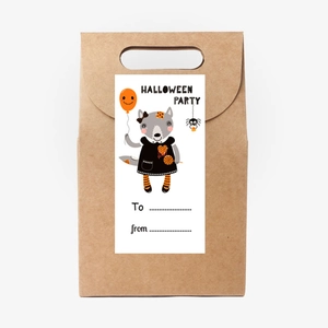 Detail of kraft paper gift bag with cute Halloween fox sticker and To/From writing space