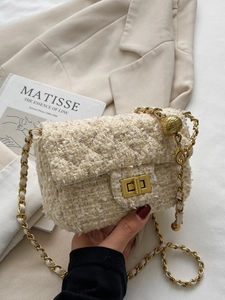 Cream tweed crossbody bag for women featuring a gold chain strap and metal lock buckle