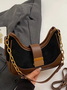 Fashionable suede moon shoulder bag with gold chain and adjustable brown strap