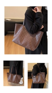 Close-up of deep brown large woven leather tote bag with classic Intrecciato weave