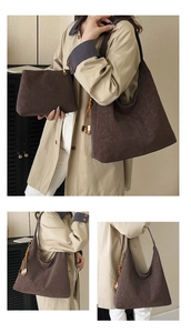 Detail of dark brown faux leather tote bag set with wooden bead tassel and small pouch
