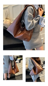 Dettaglio della borsa tote grande in pelle marrone scuro con trama morbida e design