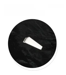 Detailed close-up of the trapezoidal silver metal buckle on a black textured backpack