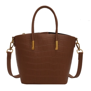 Brown faux crocodile leather bucket handbag with top handles and gold hardware