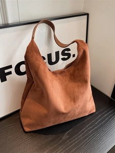 Vintage brown suede hobo tote bag with large capacity and minimalist shoulder strap design