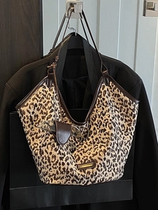 Large leopard print canvas tote bag with brown leather trim and detachable pouch