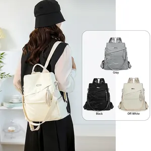 Stylish large capacity women's leather backpack in white, grey, and black colors