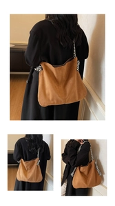Close-up of brown suede tote bag featuring contrast zebra print shoulder strap detail