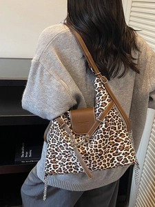 Leopard print crossbody bag with leather flap and metal chain strap for women