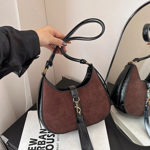 Retro crescent moon bag in dark brown suede and black patent leather with metal clasp
