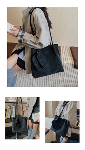 Dettaglio di una grande borsa tote nera opaca con piccola pochette coordinata inclusa