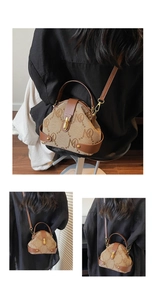 Detail of khaki canvas shoulder bag featuring vintage jacquard and brown leather trim