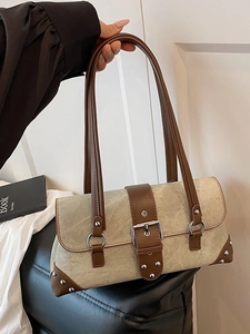 Retro canvas and brown leather shoulder bag with large silver buckle and long handles
