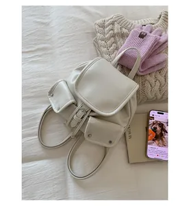 Detailed view of beige faux leather backpack with drawstring and magnetic closure